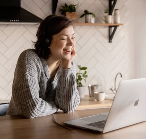 women smiling in video call