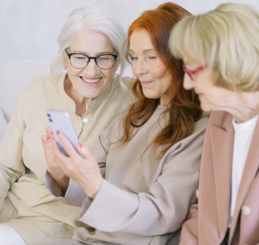 group of 3 people smiling in video call